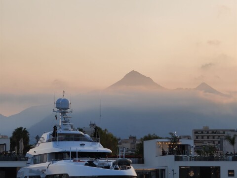 Motor yacht at a berth in Palermo at sunset – SailorOne